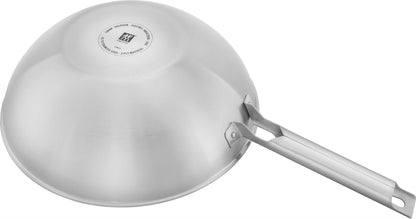 ZWILLING JOY PLUS Wok 30 cm in German is &quot;ZWILLING JOY PLUS Wok 30 cm.&quot; The product name remains the same as it is a brand and specific product designation.