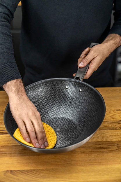 ZWILLING JOY PLUS Wok 30 cm in German is &quot;ZWILLING JOY PLUS Wok 30 cm.&quot; The product name remains the same as it is a brand and specific product designation.